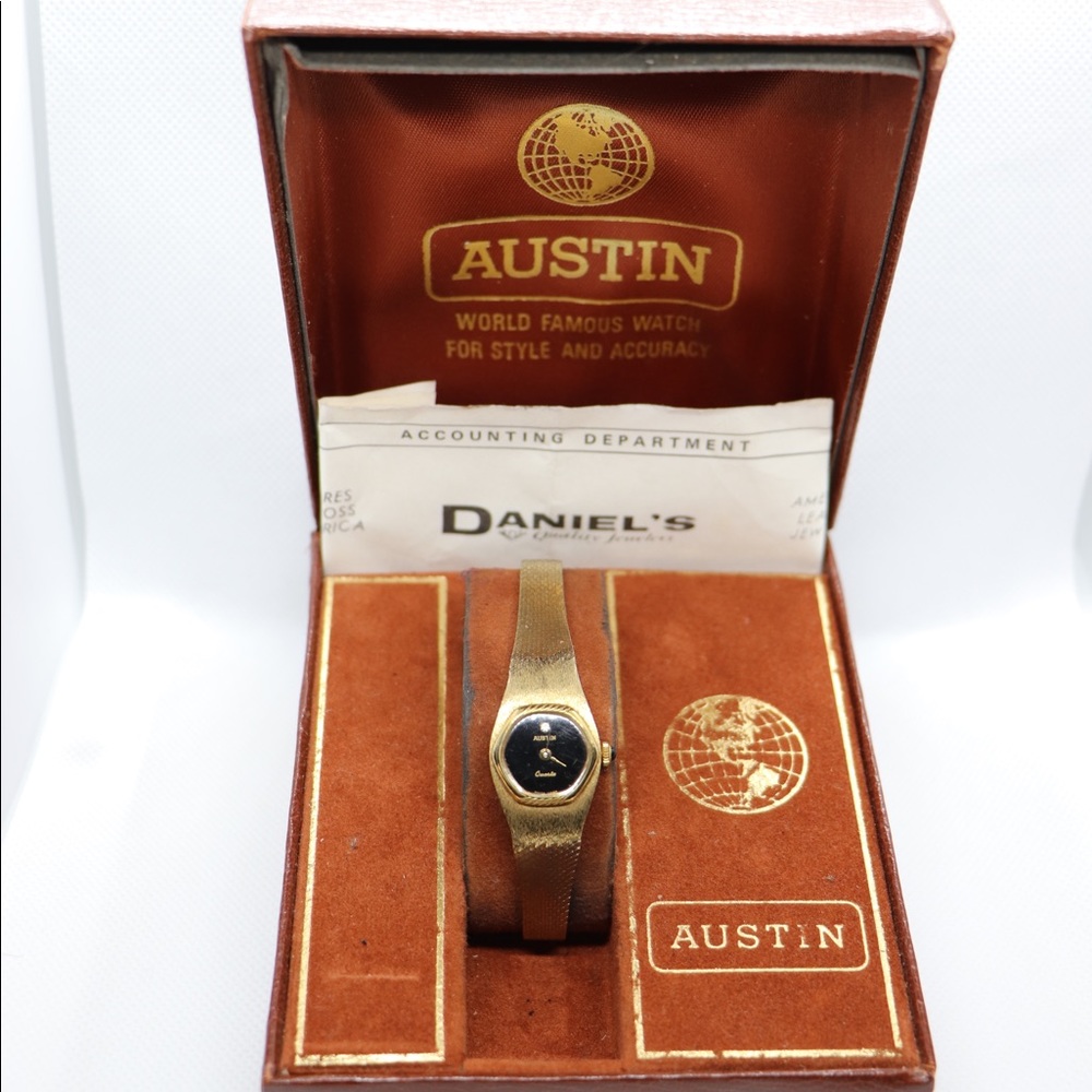 Gold Watch With Diamond At 12 o’clock